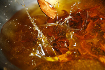 Frying dried shiitake mushroom to form umami taste on cooking oil