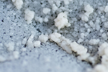 Form of white dots on bottle surface on expired cooking palm oil