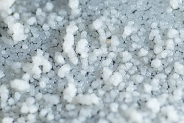 Form of white dots on bottle surface on expired cooking palm oil