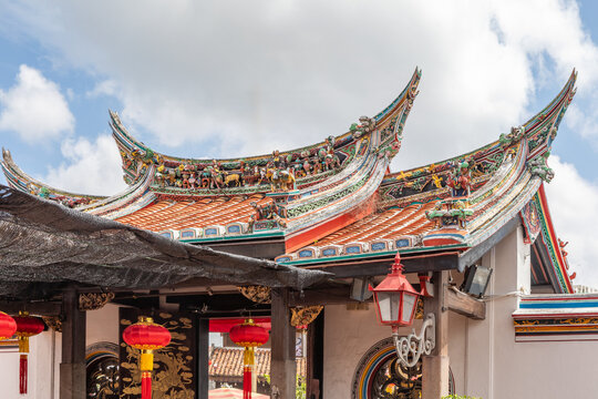 Ornate, Colorful Carvings on the Roof of an Ancient Buddhist Temple in Malacca, Malaysia 
