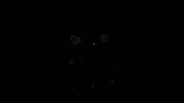 Vibrant pixel fire burst from mysterious dark structure with intense energetic glow on black