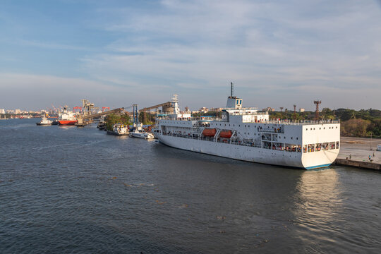 A Cruise Passenger Ship at the Dock in the Harbor of Kochi, Kerala, India on a Hazy Spring Day