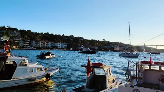 Traditional Fishing Boats and Bosphorus Bridge in Istanbul at Golden Hour
