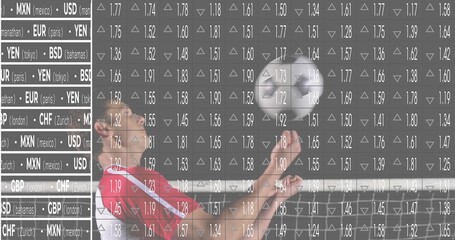 Reaching male athlete red jersey raising toward soccer ball by white rail, currency sidebar overlay