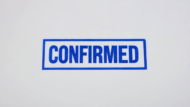 Confirmed stamp in blue ink on white background  