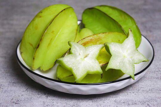 green star fruit on a plate