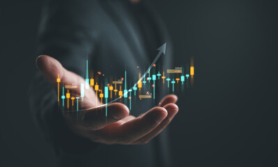 Business growth, investment concept with rising financial candlestick chart upward arrow in hand. Stock market analysis, trading strategy, profit growth, fintech data, financial performance forecast.