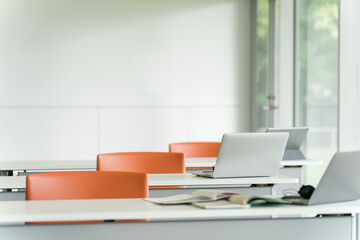 Desks and chairs in conference rooms and classrooms