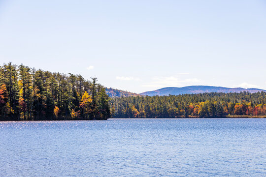 autumn landscape with lake and mountains