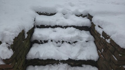 snow on snowy stairs