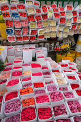 Bogota, Colombia - December 31, 2025: Bouquets of roses at the Paloquemao market in Bogota, Colombia.