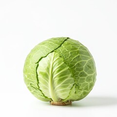 Obraz premium A fresh, crisp head of raw green cabbage sits alone on a clean white background, emphasizing its texture and natural shape and potential use, healthy eating, white background, raw food