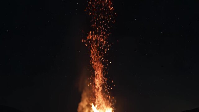 Campfire at night with stars
