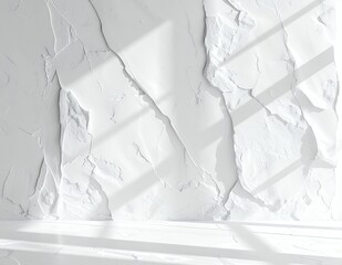 White textured wall with light and shadow creating depth.
