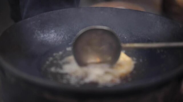 closeup shot of cooking deep fried parantha.