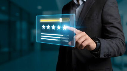 Professional man in a suit touching a glowing virtual screen to give a five star rating for customer experience in a modern digital environment