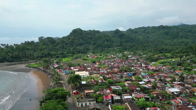 Aerial view from Ribeira Afonso coast a village from S&atilde;o Tom&eacute;,Africa. Aerial backwards drone shot.