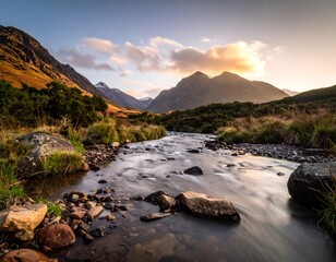 A serene mountain stream flowing through a rocky landscape at sunset with mountains in the background, image (21).jpg