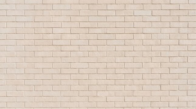 Light-colored brick wall with subtle color variations, creating a soft and textured background.