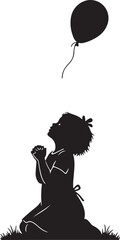Little girl praying silhouette looking up at balloon flying away