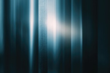 Vertical abstract with blurred blue and white streaks creating a luminous, atmospheric effect