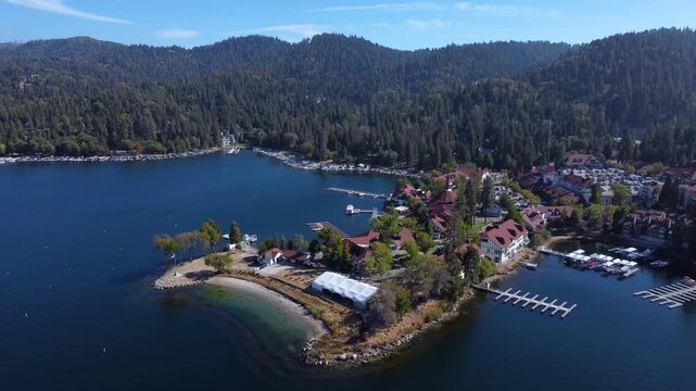 Mountain reservoir community on freshwater watershed, surrounded by forest, and lush green landscape in the San Bernardino Mountains. Spring Water basin. Lake Arrowhead, Southern California.