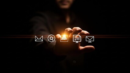 A person's hand reaching towards a glowing line of digital communication and data icons in a dark, futuristic setting.