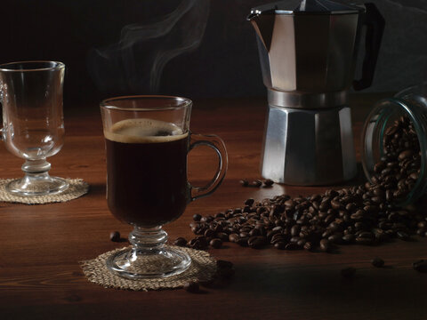 coffee beans on the background of a coffee cup and money. the concept of coffee.