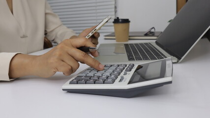 Business finance man calculating budget numbers, Invoices and financial adviser working.