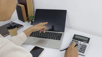 Business finance man calculating budget numbers, Invoices and financial adviser working.