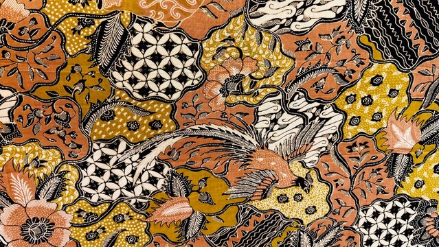 Beautiful traditional Indonesian batik fabric with abstract, floral, leaf and bird motifs.. For textiles, cotton fabrics, covers, wallpaper, printing, cards, scrapbooking