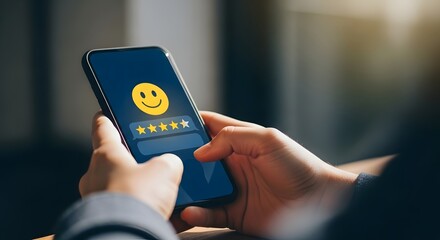 A person holding a phone with a smiley rating screen