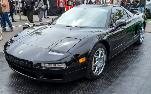 Acura NSX first generation is a revolutionary mid-engine sports car that redefined the supercar segment by proving high performance could coexist with daily reliability