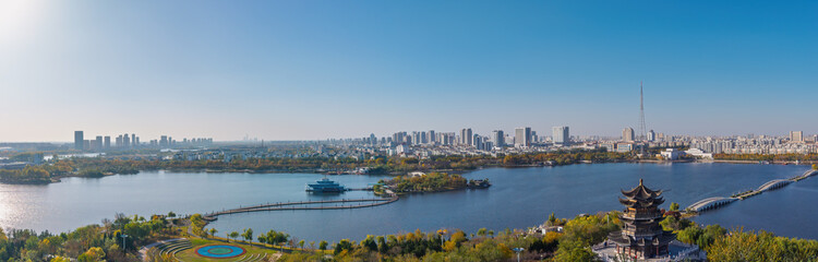 Aerial view of the urban architectural scenery and autumn landscape of Qingfeng Lake in Dongying, Shandong, China
