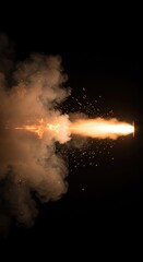 Dramatic fiery explosion of burning gases and thick smoke illuminating the dark environment following the rapid discharge of a firearm ,violent ,smoke ,atmosphere