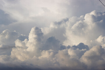 Sky with thick clouds in the evening light at sunset
