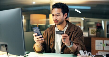 Business man, credit card and phone in office for online shopping, digital purchase and transaction. Electronic payment, fintech and employee with mobile for ecommerce, checkout process and banking