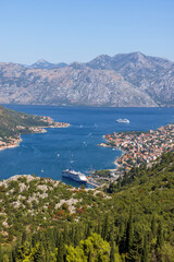 Montenegro. A breathtaking vertical landscape featuring a deep blue Bay of Kotor