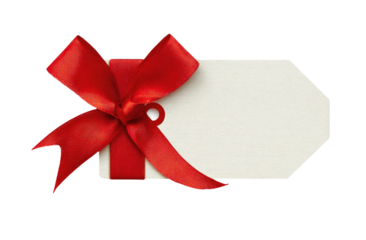 Close-up of a blank tag tied with a vibrant red ribbon bow, isolated on black