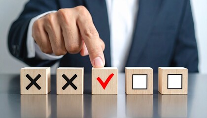 Obraz premium Hand pointing at red check mark block