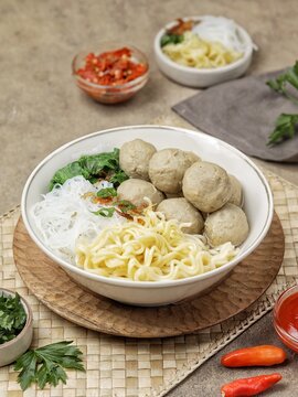 Bakso. Meatballs are a very popular food in Indonesia. Meatballs are made from ground beef or chicken and mixed with tapioca flour, garlic and other ingredients.