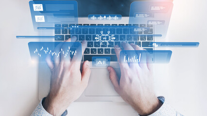 Hands typing on a laptop with digital graphics displaying data and AI tools in a bright space