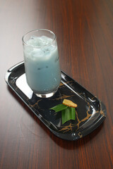Fresh iced herbal milk drink with pandan and ginger