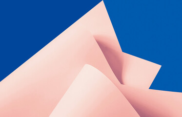 Sheets of paper in red tone on a blue background.