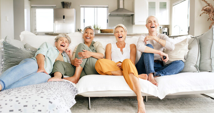 Mature, happy women or watching tv with laugh on sofa for funny joke, comedy movie or show in home. Laughing, female people or group of friends with smile for humor, series or entertainment in house
