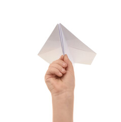 Child's hand with paper plane on white background