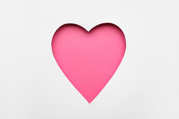 Fototapeta premium Cut white paper in shape pf heart as background. Valentine's Day celebration