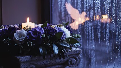 Candlelight and Flower Arrangement Near Window on Rainy Day