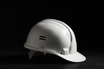 Fototapeta premium Hardhat on black background, closeup