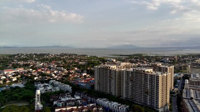 Dolly Out of Landscape Aerial of Laguna Bay and Taguig City in Metro Manila Philippines